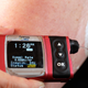 A women using an insulin pump.